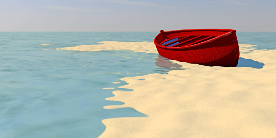 High quality 3D render of a red painted wooden boat on a sandy beach among tide-pools at high tide. Copyright: pixone3d - stock.adobe.com